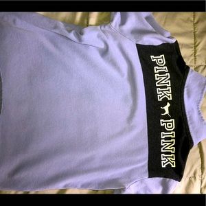 Purple sweater with collar size medium says “Pink” on back.